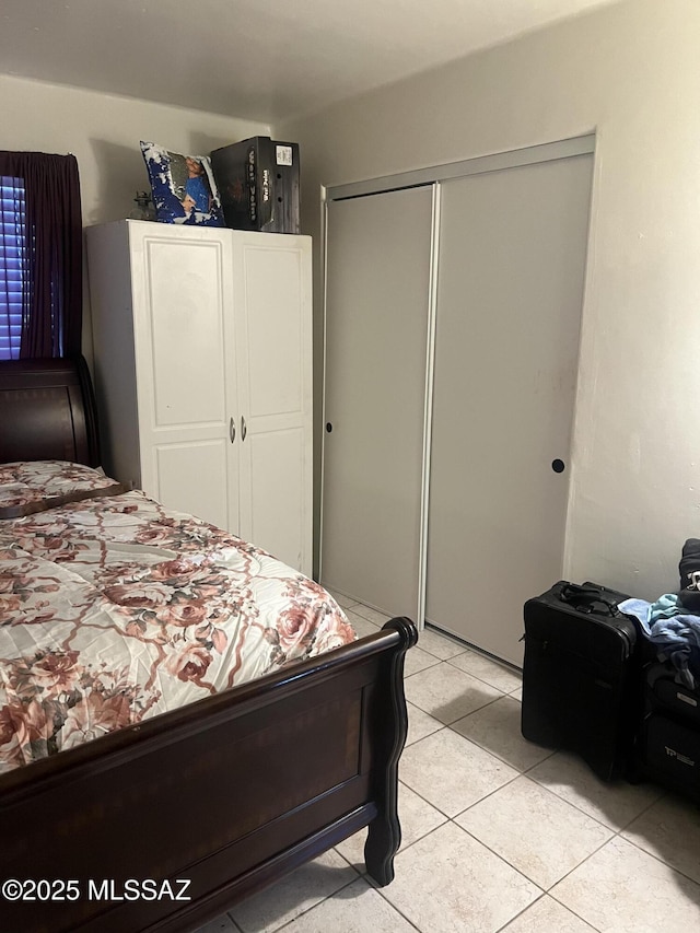 321-323 E Olive St, Tucson, AZ 85706 - bedroom with a closet and light tile patterned floors