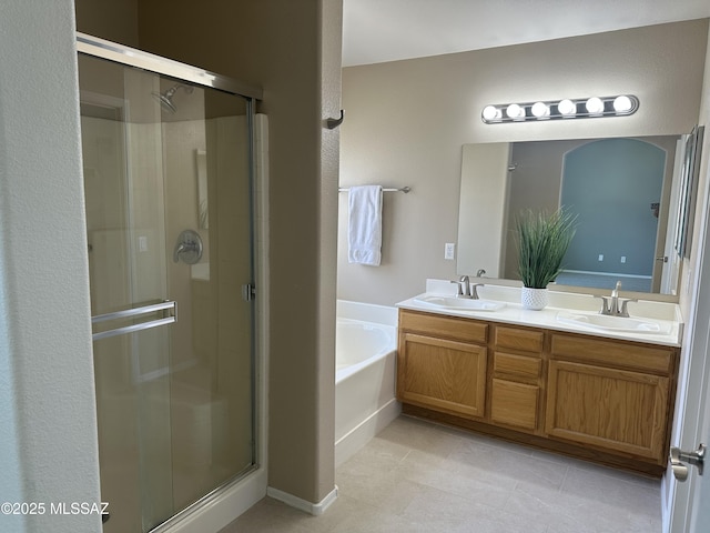 6960 W Harcuvar Dr, Tucson, AZ 85743 - full bathroom with a shower stall, a garden tub, double vanity, and tile patterned flooring