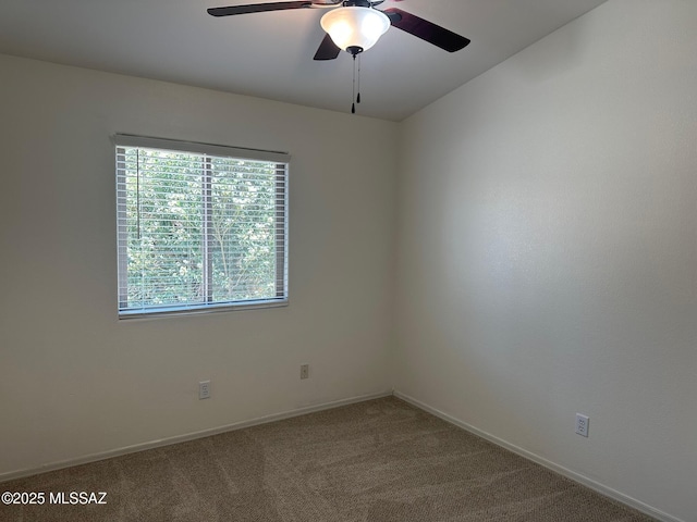 6960 W Harcuvar Dr, Tucson, AZ 85743 - empty room with ceiling fan, carpet flooring, and baseboards