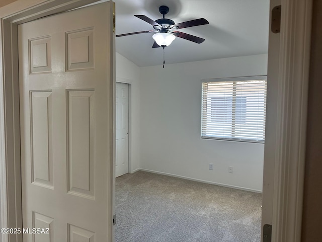6960 W Harcuvar Dr, Tucson, AZ 85743 - spare room with carpet, ceiling fan, and baseboards