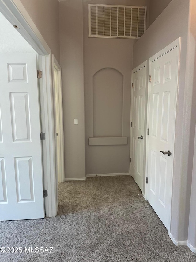 6960 W Harcuvar Dr, Tucson, AZ 85743 - hall with carpet floors and baseboards