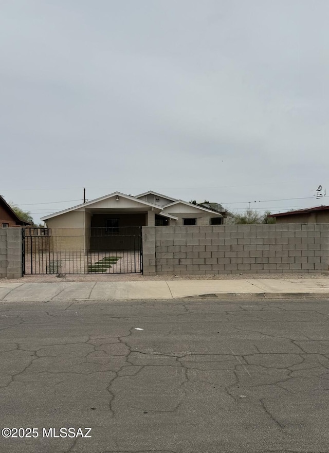 1036 W Michigan St, Tucson, AZ 85714 - view of front facade featuring a gate