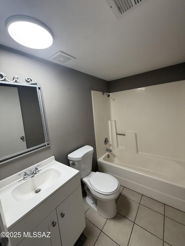 1036 W Michigan St, Tucson, AZ 85714 - bathroom with vanity, tile patterned flooring, toilet, and shower / bath combination
