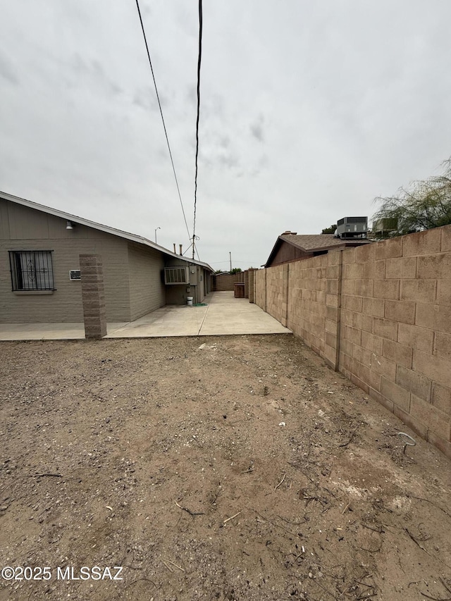 1036 W Michigan St, Tucson, AZ 85714 - fenced backyard with a patio area