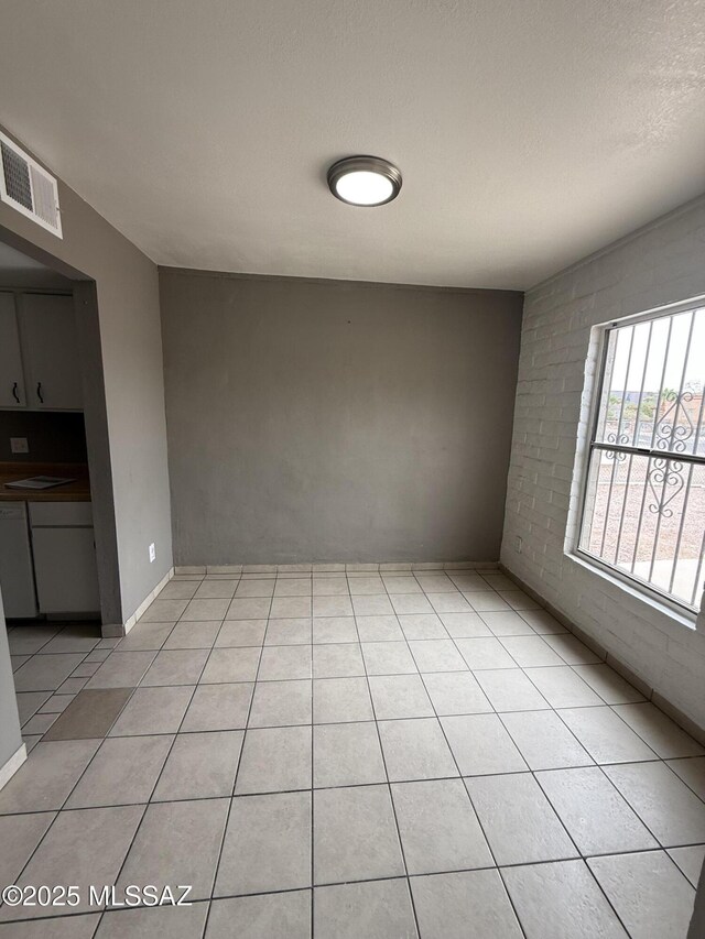 1036 W Michigan St, Tucson, AZ 85714 - unfurnished room with light tile patterned floors