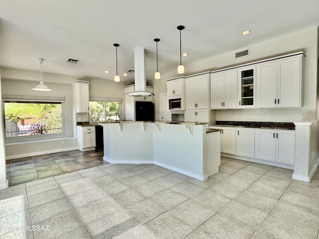 13942 N Cirrus Hill Dr, Oro Valley, AZ 85755 - kitchen with dark countertops, built in microwave, baseboards, white cabinetry, and glass insert cabinets