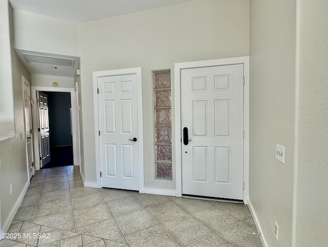 13942 N Cirrus Hill Dr, Oro Valley, AZ 85755 - foyer featuring light tile patterned floors and baseboards