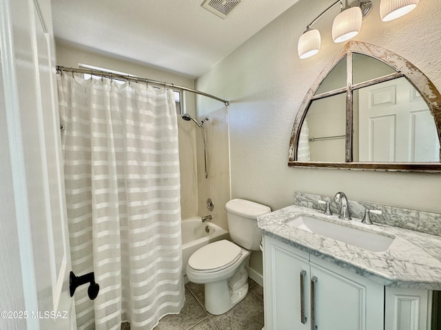 13942 N Cirrus Hill Dr, Oro Valley, AZ 85755 - full bath featuring a textured wall, toilet, vanity, shower / bathtub combination with curtain, and tile patterned flooring