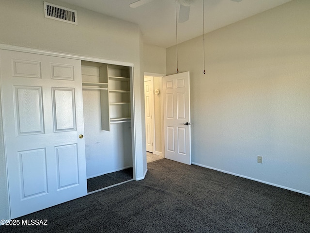 13942 N Cirrus Hill Dr, Oro Valley, AZ 85755 - unfurnished bedroom with dark carpet, a closet, and baseboards