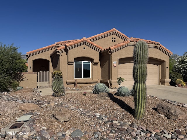 13942 N Cirrus Hill Dr, Oro Valley, AZ 85755 - mediterranean / spanish house with a tiled roof, a garage, concrete driveway, and stucco siding