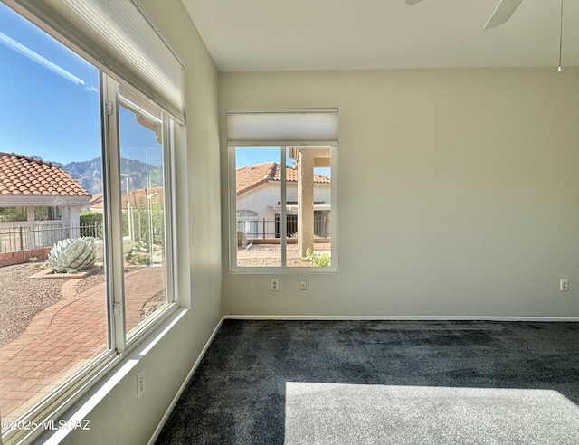 13942 N Cirrus Hill Dr, Oro Valley, AZ 85755 - unfurnished room featuring carpet, baseboards, a mountain view, and ceiling fan