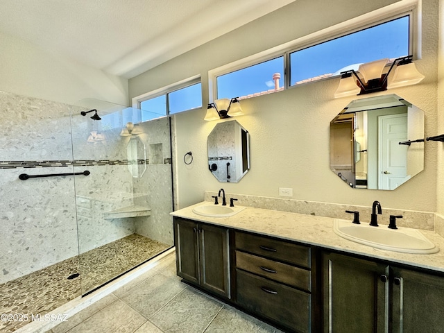 13942 N Cirrus Hill Dr, Oro Valley, AZ 85755 - full bathroom with walk in shower, double vanity, and tile patterned flooring