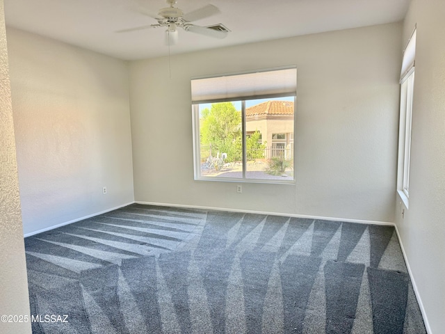 13942 N Cirrus Hill Dr, Oro Valley, AZ 85755 - unfurnished room featuring carpet floors, a ceiling fan, and baseboards