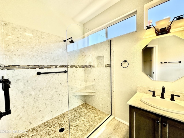 13942 N Cirrus Hill Dr, Oro Valley, AZ 85755 - bathroom with a walk in shower, vanity, and tile patterned floors