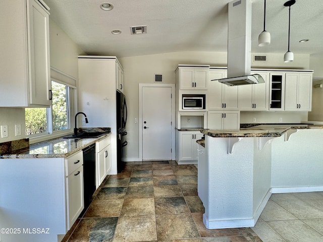 13942 N Cirrus Hill Dr, Oro Valley, AZ 85755 - kitchen with black appliances, dark stone counters, a sink, a kitchen breakfast bar, and white cabinets