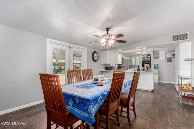 1341 E Bilby Rd, Tucson, AZ 85706 - dining area featuring a chandelier, baseboards, dark wood-style floors, a ceiling fan, and a textured ceiling