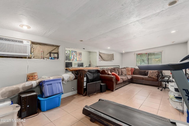1341 E Bilby Rd, Tucson, AZ 85706 - tiled living area featuring a wall unit AC, a textured ceiling, and recessed lighting