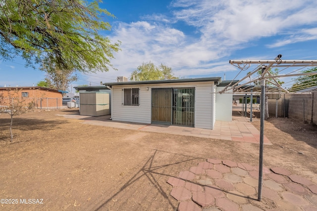 8401 E Shasta Dr, Tucson, AZ 85730 - rear view of house with a patio area and a fenced backyard