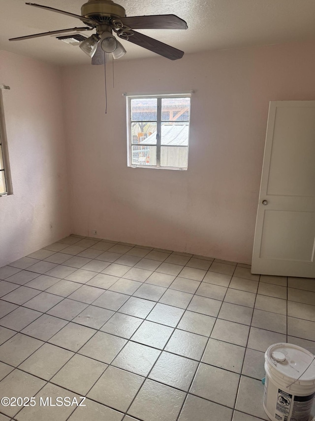 unfurnished room featuring ceiling fan