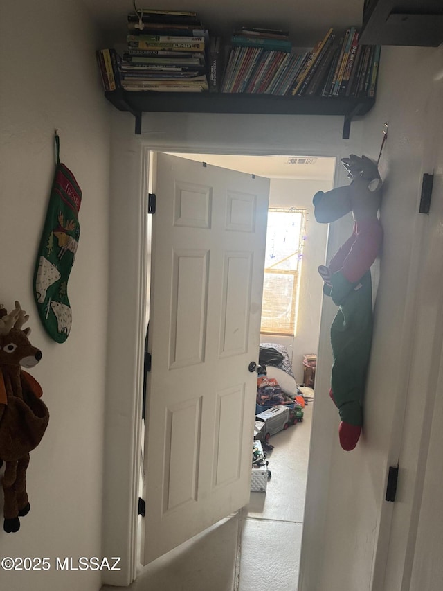 hallway with carpet