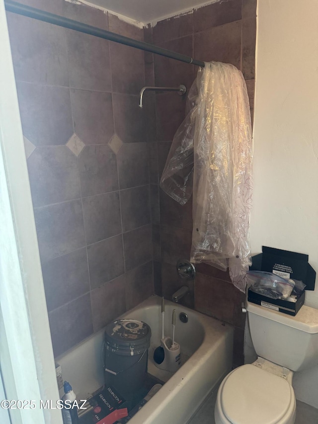 full bath featuring toilet and shower / washtub combination