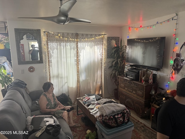 living room with a ceiling fan