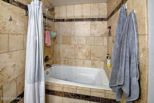 6631 N Camino Padre Isidoro, Tucson, AZ 85718 - bathroom with a combined bath / shower with jetted tub