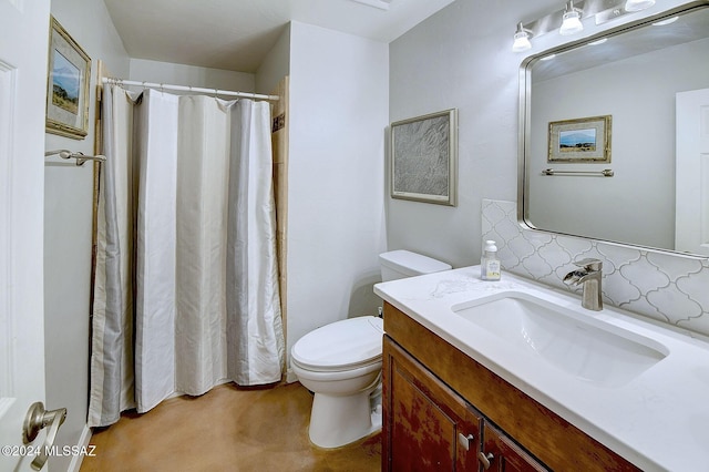 6631 N Camino Padre Isidoro, Tucson, AZ 85718 - bathroom featuring toilet, vanity, finished concrete floors, and curtained shower