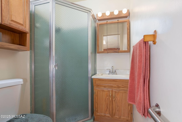 2702 E Prince Rd, Tucson, AZ 85716 - bathroom with vanity, a shower stall, and toilet