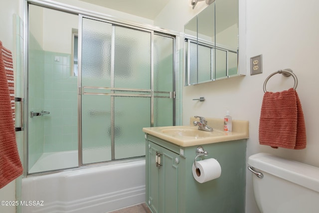 2702 E Prince Rd, Tucson, AZ 85716 - full bath with toilet, vanity, and bath / shower combo with glass door
