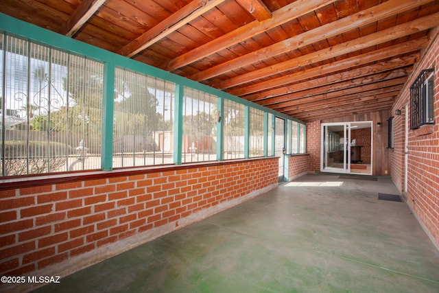 2702 E Prince Rd, Tucson, AZ 85716 - unfurnished sunroom with beam ceiling