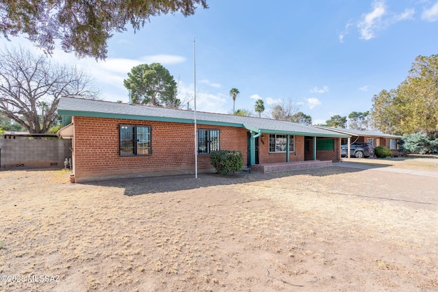 2702 E Prince Rd, Tucson, AZ 85716 - ranch-style house featuring brick siding