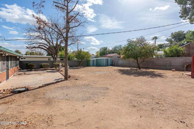 2702 E Prince Rd, Tucson, AZ 85716 - fenced backyard featuring a patio