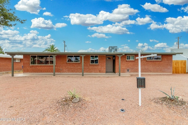 7433 E 19th St, Tucson, AZ 85710 - single story home featuring brick siding and central AC