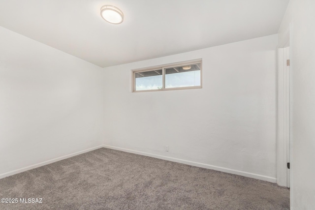 7433 E 19th St, Tucson, AZ 85710 - carpeted empty room with baseboards