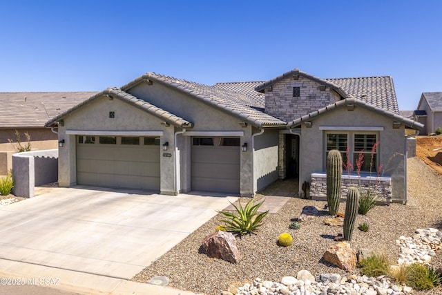 61672 E Talc St, Oracle, AZ 85623 - view of front facade with a garage, stucco siding, driveway, and a tile roof
