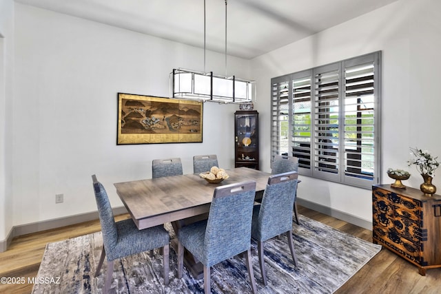 61672 E Talc St, Oracle, AZ 85623 - dining space featuring wood finished floors and baseboards