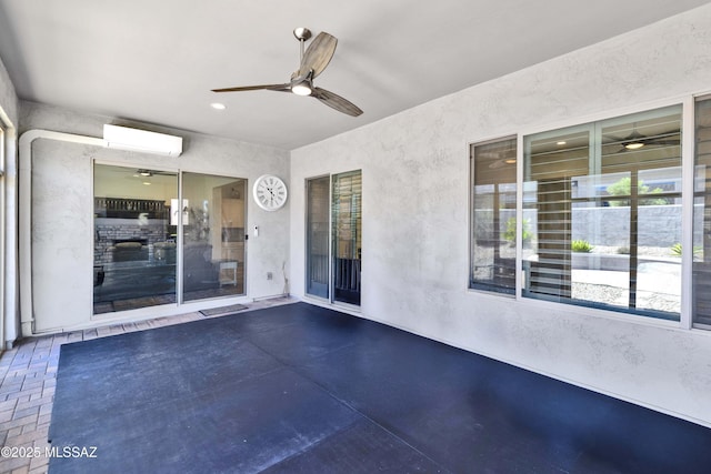 61672 E Talc St, Oracle, AZ 85623 - view of patio / terrace with a wall mounted AC and a ceiling fan