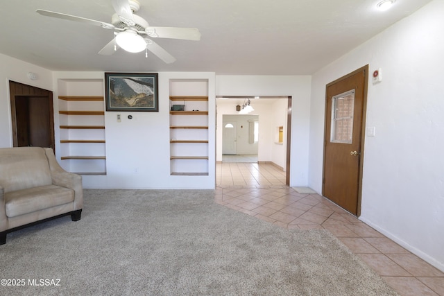 3010 E Sylvia St, Tucson, AZ 85716 - unfurnished room with tile patterned flooring, ceiling fan, and carpet floors