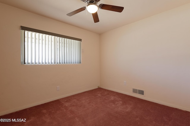 3010 E Sylvia St, Tucson, AZ 85716 - empty room with carpet floors, a ceiling fan, and baseboards