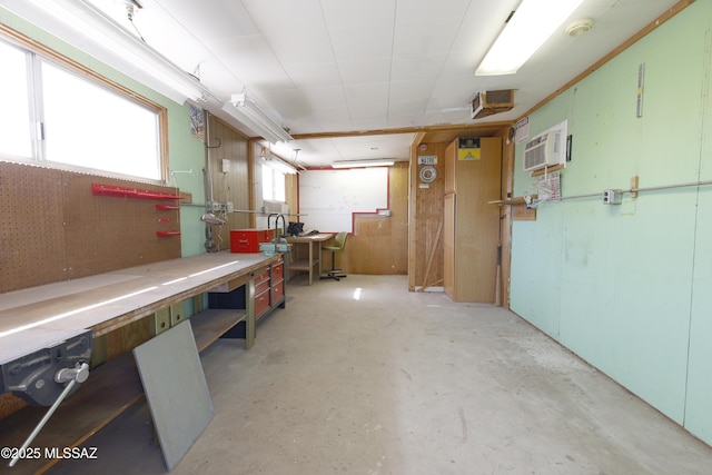 3010 E Sylvia St, Tucson, AZ 85716 - basement featuring a workshop area and a wall unit AC