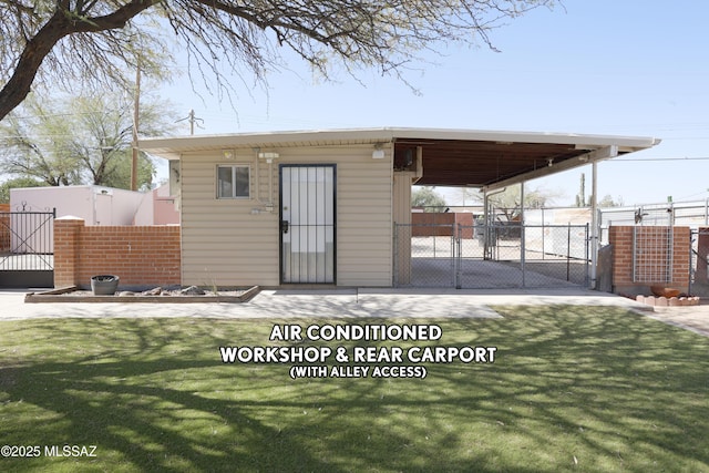 3010 E Sylvia St, Tucson, AZ 85716 - view of outbuilding featuring a gate and an attached carport