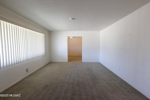 3010 E Sylvia St, Tucson, AZ 85716 - empty room with carpet flooring and a smoke detector