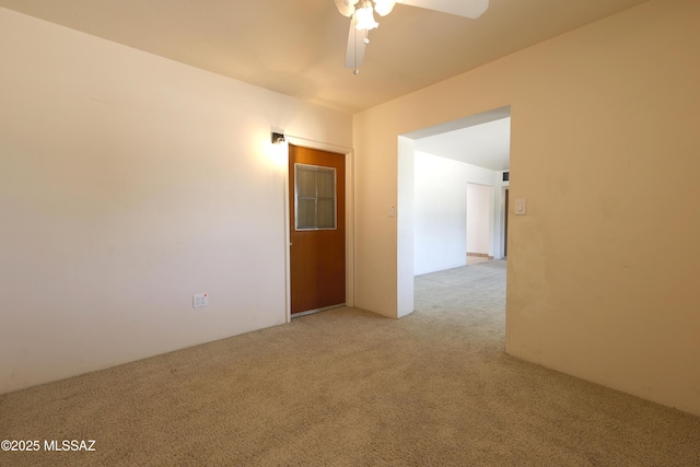 3010 E Sylvia St, Tucson, AZ 85716 - spare room with light carpet and a ceiling fan