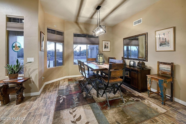 2500 N Fennimore Ave, Tucson, AZ 85749 - dining space featuring wood finish floors and baseboards