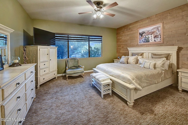 2500 N Fennimore Ave, Tucson, AZ 85749 - bedroom featuring multiple windows, dark colored carpet, a ceiling fan, and baseboards