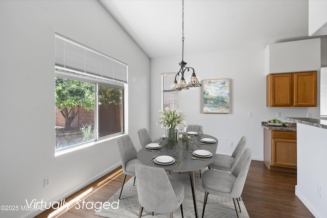 9488 N Elan Ln, Tucson, AZ 85742 - dining room featuring dark wood finished floors and baseboards