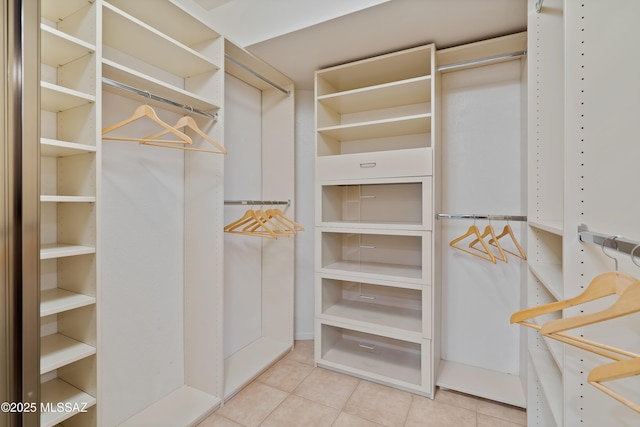 14488 N Rock Springs Ln, Oro Valley, AZ 85755 - spacious closet with tile patterned floors