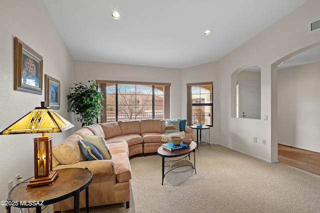 14488 N Rock Springs Ln, Oro Valley, AZ 85755 - carpeted living area featuring recessed lighting, baseboards, and arched walkways
