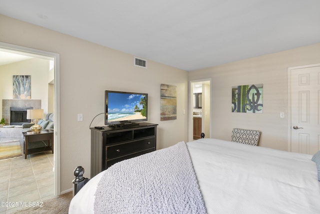 5051 N Sabino Canyon Rd Unit 2162, Tucson, AZ 85750 - bedroom with a tile fireplace